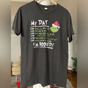 Rustic United women’s Christmas T-Shirt  I am Booked shirt size medium. Black